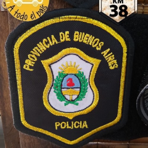 escudo policia oro