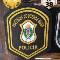 escudo policia oro cordones