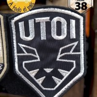 escudo UTOI plata