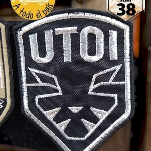 escudo UTOI plata