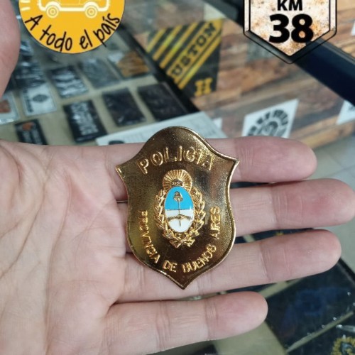 chapa PBA chica oro 1