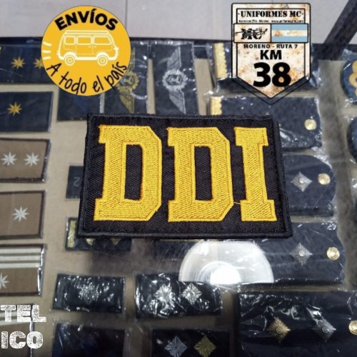cartel chico DDI amarillo