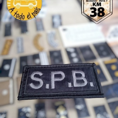 cartel chico SPB gris