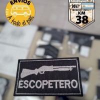 cartel chico escopetero gris